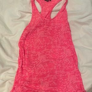 Hot pink tank top, versatile, perfect for casual wear or working out